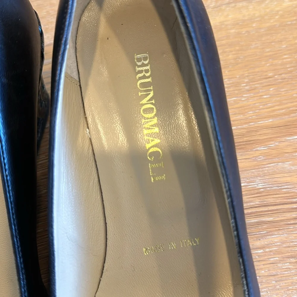 Bruno Magli black leather wedges with basket wave heel